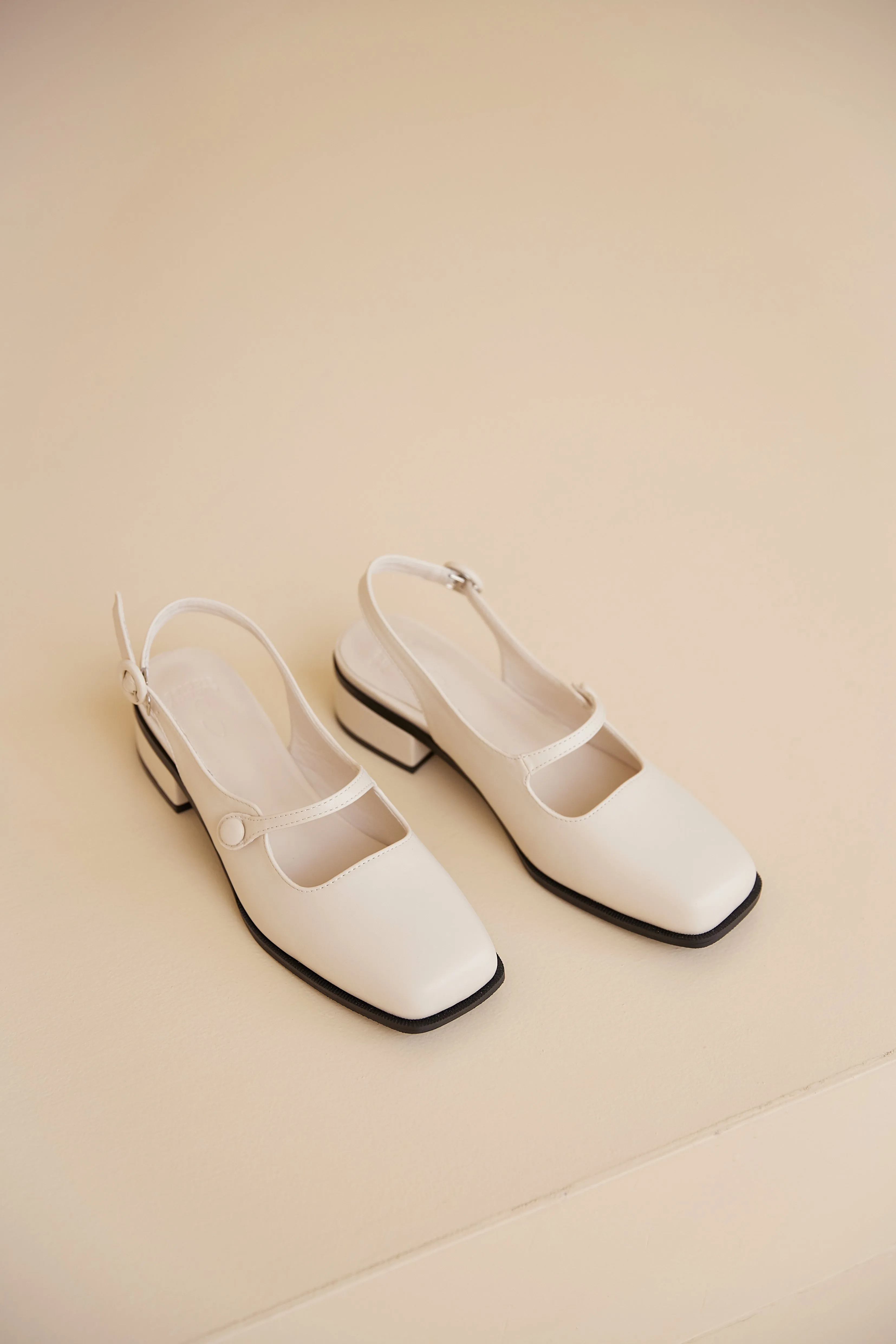 Aeira Mary Jane Heels in Cream